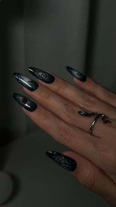 Spider Inspired Nails, Spiderweb Almond Nails, Purple Nails With Spider Web, Black Nails Acrylic Halloween, Punk Halloween Nails, Plum Halloween Nails, Nails With Metallic Design, Black Halo Nails, Halloween Nails With Glitter