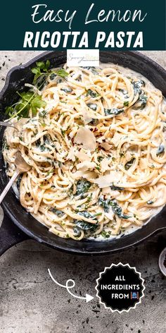 an easy lemon ricotta pasta in a cast iron skillet with basil and parsley