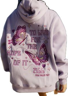 The "To Live For the Hope of it All" Oversized Hoodie is crafted from top-quality fabrics, while having an exquisite embroidery art of fine-detailed butterflies. The PPP palm embroidered above our hearts is a symbol of unity within the Pink Palm Puff community, reminding us all of the love we share. Pink Palm Puff Hoodie Purple, Hoodie Collection Aesthetic, Hoodie Wishlist, Preppy Sweatshirts, Inspiring Message, Classic American Style, Cozy Fabric, Bright Side