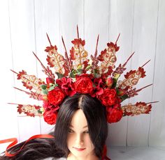 This wonderful red halo crown wedding will make you the center of a festival or wedding. Your friends will appreciate this Gold lace halo headpiece bridal. Crown spikes are made of wood spiked. Spikes are neatly glued to the metal headband that I wore with tape. Gold spikes are painted with gold paint.  The flower headdress is decorated with red roses and lace. Each flower is securely fastened with felt.  The height of the spiked is about 7.48 inches (19 cm). More of my spiked halo crown you can see here https://www.etsy.com/ru/shop/byIraFomina?ref=hdr_shop_menu§ion_id=26561099 Address to me on any question. I will be happy to help you. Halo Crown Wedding, Halo Headpiece, Flower Headdress, Halo Crown, Metal Headband, Red Crown, Headpiece Bridal, Wedding Gold, Crown Wedding