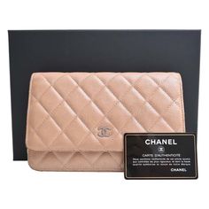 Brand: Chanel Model: Wallet On Chain Color: Beige Material: Leather Inclusions: Box, guarantee Dimensions: 13cm x 19cm x 3cm Serial number: 20345540 Condition: AB - good condition. The Chanel Matelasse Wallet on Chain is a stylish accessory designed for women, crafted from exquisite beige caviar leather. This versatile piece can be used as both a chain wallet and a shoulder bag, making it ideal for various occasions. However, there are some signs of wear, with slight rubbing and discoloration on Luxury Beige Chic Wallet On Chain, Luxury Beige Leather Wallet On Chain, Luxury Designer Wallet On Chain With Gold-tone Hardware, Chanel Wallet On Chain Beige, Luxury Leather Wallet On Chain With Gold-tone Hardware, Chanel Caviar, Chanel Wallet, Chanel Model, Wallet Chain