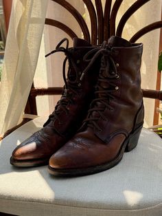 These are really nicely made vintage work boots! Very high quality leather and sole! They will last you a very very very long time! They do have minor wear but are very strong with years and years of life left. please see photos! ALL SALES ARE FINAL- ALL ITEMS ARE AS IS - NO RETURNS. I believe they fit like a women's 7 but please go by the measurements and keep in mind they have a pointed toe. Outsole 9 3/4 Width at widest 3 3/4 Insole 9 1/2 Vintage Work Boots With Goodyear Welt Construction, Vintage Snip Toe Work Boots With Leather Sole, Vintage Moc Toe Boots With Reinforced Toe, Vintage Steel Toe Boots With Plain Toe, Vintage Goodyear Welted Work Boots With Round Toe, Western Style Brown Moto Boots With Vibram Sole, Vintage Leather Boots With Steel Toe, Vintage Work Boots With Leather Sole And Round Toe, Brown Western Moto Boots With Vibram Sole