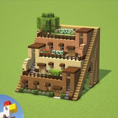 an image of a building made out of blocks and bricks with plants growing on the balconies