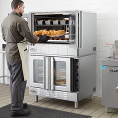 Perfect for virtually all cooking and baking applications, this Main Street Equipment CG2LK double deck full size liquid propane convection oven is an invaluable asset to any commercial kitchen. Powered by 108,000 total BTU, the unit offers two full size cavities that house 3 adjustable wire racks each. These racks rest on the 11 sets of slides along the interior side walls, so you can benefit from a variety of rack configurations to best accommodate your trays or full size food pans.   Reaching Commercial Appliances In Home Kitchen, Deck Oven Bakery, Kitchen Equipment Storage, Small Commercial Oven, Electric 36in Double Oven, Bakery Equipment, Commercial Pizza Oven, Bakery Food, Bakery Supplies