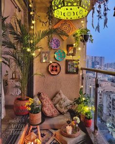 a balcony with lots of plants and lights