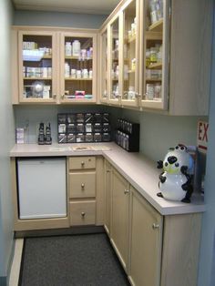 a kitchen with lots of counter space and cabinets