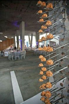 there are many donuts hanging from the ceiling