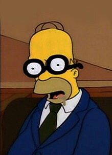 the simpsons is wearing glasses and a suit