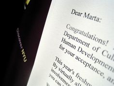 a close up view of the back of a paper with writing on it that says dear marra congratulations department of culture human development for your access this year