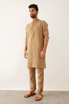 Buy Brown 100% Linen Pintuck Textured Fez Kurta For Men by Son of A Noble Snob Online at Aza Fashions. Trendy Kurta For Men, Short Kurta For Men, Stylish Boy Clothes, Boys Kurta Design, Indian Groom Wear, Kurta For Men, Kurta Patterns, Kurta Set For Men, Men's Kurta