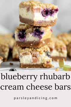 blueberry rhubarb cream cheese bars stacked on top of each other