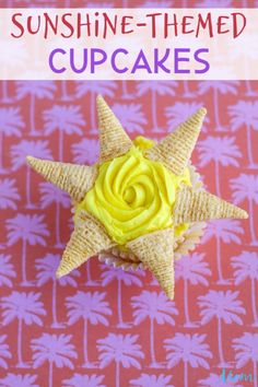 a star shaped cupcake with yellow frosting on top and the words sunshine - themed cupcakes above it