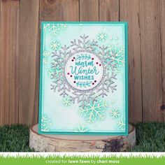 a card with snowflakes on it and the words merry winter wishes written in white