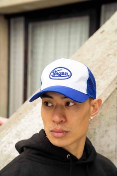 Classic retro vintage style trucker cap featuring an iconic "vegan" 3D puff embroidery on the front, airy mesh rear and adjustable snapback panel strap.  * Blue & White trucker hat   * Curved peak  * Unisex regular fit with adjustable one size fits most strap  * Embroidered 3D puff motif on front   * [BUY 1, PLANT 1](https://plantfacedclothing.com/pages/buy-plant "Buy 1 Plant 1 - Carbon Offset Tree Planting With Every Purchase") -- yay, a tree will be planted with this purchase, and every single Puff Embroidery, White Trucker Hat, Carbon Offset, White Caps, Retro Vintage Style, Style Retro, Buy 1, Trucker Cap, Trees To Plant