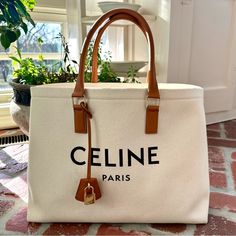 Gorgeous Discontinued Celine Tote With Dust Bag! Gently Used With A Few Slight Black Marks On The Outside And Brown Marks On The Inside (See Photos). They Could Probably All Come Out With Gentle Cleaning, But I Haven't Ever Tried. Overall In Excellent Condition! In A House With No Pets Or Smoking! Ships From Usa, So No International Shipping Fees Or Expensive Customs Fees! Look At Photos Before Buying Please-No Returns! Celine Cabas Black Tote, Celine Horizontal Cabas, Celine Tote Bag, Celine Tote, Skin White, Celine Bags, Bag Canvas, Hand Bag, Womens Tote Bags