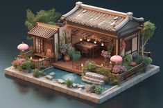 a miniature model of a japanese house with water and plants in the front, sitting on an island