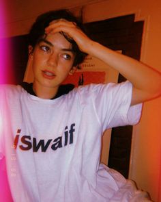 a woman in a t - shirt that says swaff on it