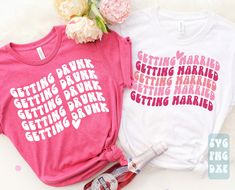 two t - shirts that say getting married, getting married and getting married next to each other