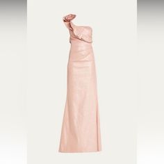 a pink dress with one shoulder and an asymmetrical bow at the top