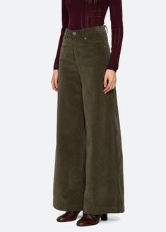 The Carine corduroy high waisted jeans feature a wide leg silhouette. Pairs perfectly with the Carine corduroy jacket. Details: 98% cotton, 2% spandex button & zipper closure designed for a slimmer fit style #AW24-006 model is 5'10'' and wearing a size 4 Utility Corduroy Straight Leg Bottoms, Corduroy Wide Leg Bottoms With Button Closure, Wide-leg Cotton Jeans With Button Closure, Luxury Cotton Wide-leg Cargo Jeans, High-rise Cotton Jeans With Seam Detailing, Jacket Details, Sea Ny, High Waisted Jeans, Corduroy Jacket