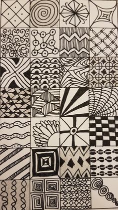 a black and white drawing of many different designs on it's surface, with lines in the middle