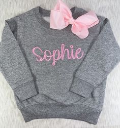 Girls monogrammed sweatshirt embroidered Name  Toddler monogrammed shirt These precious sweatshirts are great for any and every day! They are simple but so sweet! These are soft jersey sweatshirts with embroidered letters.    **if you need a different size or would like a different color, just put what you would like in the comment box.   Turn around time is 3-5 business days. This means that once you order, I will complete the item and drop it at the post office within that time. Then you need Toddler Monogram Shirt, Personalized Cute Crew Neck Sweater, Personalized Pink Crew Neck Sweater, Personalized Crew Neck Sweatshirt For Fall, Pink Monogrammed Crew Neck Top, Pink Monogram Crew Neck Top, Pink Crew Neck Top With Monogram, Personalized Pink Crew Neck Sweatshirt, Personalized Pink Casual Sweatshirt