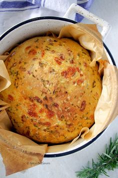 a loaf of bread in a bowl on a table