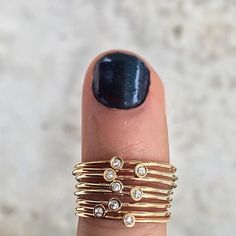 The most versatile and dainty piece in our collection, this solo diamond ring can be stacked with nearly everything. Simplistic and minimalist, it adds extra sparkle to any ring stack. This 14kt gold diamond ring stacks perfectly with the Gold Diamond Trio Ring or our Stella rings. Custom 1/2 and 1/4 sizes are available for a $25 resizing fee. Please put your size request in the notes section during online checkout. To order this piece in a different metal, please email info@lakaiser.com. **We o Simplistic Jewelry, Ring Stacks, Trio Ring, Gold Rings Simple, Diamond Stacking Rings, Ring Stack, Gold Diamond Ring, Rings Cool, Gold Diamond Rings