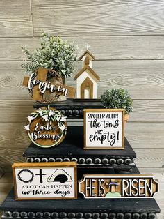 a black and white cake with wooden signs on it