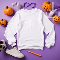 Featuring a flat lay white Gildan 18000 sweatshirt mockup looking all ready for your Halloween store !  This mockup template is perfect for anyone in the Print On Demand industry or looking for a simple and stylish lifestyle mockup. With this digital download, you'll have access to a high-quality image that'll be sure to make your shop stand out and sell those shirts! Don't wait, add this beautiful mockup to your collection today!  Available colors: White  Mockup Details:  Brand:  Gildan 18000 ATTN: Although most colors should match the mockups on Printify and Printful, there may be a few that are slightly off. If you encounter any issues with the color you want to use, please send me a message and I will work with you to find a solution.  This is an instant download with no physical item White Halloween Sweatshirt For Streetwear, Casual White Sweatshirt For Halloween, White Halloween Hoodie Long Sleeve, White Halloween Hoodie, White Long Sleeve Hoodie For Halloween, White Long Sleeve Halloween Hoodie, White Long Sleeve Halloween T-shirt, White Long Sleeve T-shirt For Halloween, Fall White Printed Sweatshirt