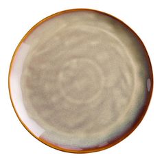 an orange and white plate on a white background