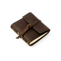 a small brown leather notebook with a tie on the front and side, sitting on a white surface