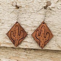 Earrings are lightweight and hand tooled from scratch. Finished product may vary slightly from the picture due to its handmade nature. Earrings are finished with silver earring hooks for easy wearing.