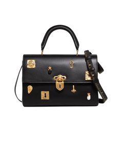 [vc_row][vc_column width=”1/3″][vc_column_text text_larger=”no”] Schiaparelli Schiaparelli Large Bijoux Secret Bag A handbag crafted from smooth black lambskin is adorned with gilded brass jewelry studs.   Secured with a gilded brass toggle clasp in the shape of a Padlock, which is engraved with the Schiaparelli signature.   A handle is attached to the bag by gilded brass fasteners to carry by hand. Shoulder strap in beige lambskin embossed in a gold ink Measuring tape pa Small Leather Accessories, Brass Fasteners, Stylish Celebrities, Fashion World, Gold Ink, Brass Jewelry, The Red Carpet, Leather Items, Pearl Drop Earrings