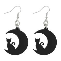 "Find the Black Cat & Moon Dangle Earrings by Celebrate It™ at Michaels. Featuring a cat sitting in the crook of a crescent moon, this spooky pair is perfect for the office or using to finish a costume as you enjoy October festivities with family, friends and co-workers. Show off your playful side this Halloween with these fun dangle earrings from Celebrate It. Featuring a cat sitting in the crook of a crescent moon, this spooky pair is perfect for the office or using to finish a costume as you Cat Moon, The Black Cat, Halloween Costume Accessories, Co Workers, Cat Sitting, Crescent Moon, Costume Accessories, Family Friends, Feminine Style