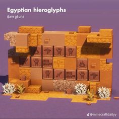 the egyptian hieroglyphs are made out of cardboard boxes and paper machs