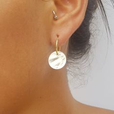 "Modern hoops hammered disc earrings. Each earring composed of two hammered discs- one gold and one silver, So you get two sets of earrings at the price of one 😉 You can even play with it and wear one with the gold disc in the front and one with the silver in the front 😃 Super lightweight, and dainty yet it has a nice matt-shiny gold \\silver presence. These hammered gold and silver disc earrings will be your new favorite piece. Perfect for everyday wear or for a special occasion. THE DETAILS: Minimalist Hammered Round Hoop Earrings, Minimalist Hammered Round Disc Earrings, Dainty Hammered Round Hoop Earrings, Minimalist Hammered Circle Earrings, Hammered Open Circle Earrings For Everyday, Round Dangle Earrings, Earrings Double, Gold Disc, Disc Earrings