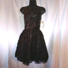 Add A Touch Of Style To Your Wardrobe With This Beautiful Mini Party/Cocktail Dress. Us Size 3 (Juniors) Color Black Ruched Detailing/Empire Waist Embroidered Fabric Over Till Skirt Zip Closure 100% Polyester Fabric Measurements 17" Bust 24" Waist 29" Length Nwt All Reasonable Offers Will Be Accepted Same/Next Day Shipping Available A-line Strapless Dress For Prom Party, Fit And Flare Strapless Dress For Party, Black A-line Strapless Dress For Prom, Party Mini Dress Fit And Flare With Sweetheart Neckline, Party Mini Dress With Sweetheart Neckline, Strapless Dress With Fitted Bodice For Cocktail Parties, Party A-line Fit And Flare Strapless Dress, Flirty A-line Strapless Dress For Party, Elegant Fit And Flare Strapless Dress For Party