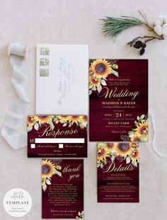 wedding stationery with sunflowers and burgundy wood