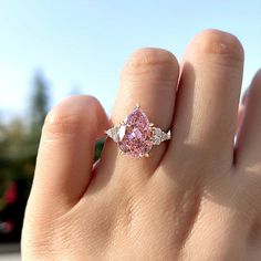 Pear Cut Pink Gemstone Three Stone Engagement Ring In Sterling Silver – Juluro Pink Sapphire Engagement Ring, Pink Topaz Ring, Pink Engagement Ring, Pink Sapphire Ring Engagement, Sterling Silver Wedding Band, Three Stone Engagement Ring, Silver Wedding Bands, Sapphire Engagement Ring, Pink Topaz