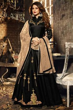 Dazzle everyone around as you walk into a wedding wearing this Black Banglori Silk Anarkali Suit which makes it astonishingly charming. This Collar neck and Full Sleeve garment embellished in zari and stone work. Silk Anarkali Gown, Latest Salwar Kameez