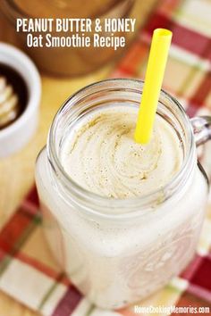 peanut butter and honey oat smoothie recipe in a mason jar with a yellow straw