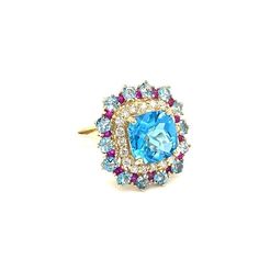 This is part of Chairish’s Fine Jewelry assortment.  This is part of Chairish’s Fine Jewelry assortment.  6.41 Carat Blue Topaz Sapphire Diamond Yellow Gold Cocktail Ring  Beautiful to say the Least!   This Ring has a magnificent Cushion Cut Blue Topaz that weighs 3.93 Carats and is surrounded by 14 Blue Topaz that weigh 1.73 Carats, 14 Pink Sapphires that weigh 0.31 Carats and it is also accented with 20 Round Cut Diamonds that weigh 0.44 Carats (Clarity: SI1, Color: F). The total carat weight Yellow Gold Cocktail Ring, Gold Cocktail Ring, Gold Cocktail, Unique Beauty, Sapphire Diamond, Ring Size 7, Cocktail Ring, Cushion Cut, Pink Sapphire