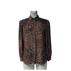 "Condition: excellent, pre-owned Label: Jordan Size: 9 / 10 100% polyester button front padded shoulders wrinkle free material machine wash feline print colors: brown and black faux leather yoke shoulder: 16\" bust: 42\" sleeve length: 24\" length: 27\" (Internal Use Only: TYEDZ  - *e.in / nh.l-oo / G958B-5 / b-B1 / **t1 / T0.7)" Frederick Md, Colors Brown, Wrinkle Free, Black Faux Leather, 9 And 10, Womens Clothing Tops, Feline, Down Shirt, Blouses For Women