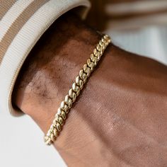 Introducing our Miami Cuban Bracelet, now in 6mm, that will quickly become a must-have in your collection. This 18k Yellow Gold piece is the perfect medium size for everyday wear, featuring our signature GLD clasp. This staple is great for stacking or paired with the matching Miami Cuban Link Chain in 6mm. This product is guaranteed for life – GLD will repair or replace the item should you experience any defects in craftsmanship or breakage. Specifications - Width: 6mm - Length: 6", 7", 8", & 9" Classic Cuban Link Bracelets For Everyday, Classic Cuban Link Bracelet For Everyday, Classic Tarnish Resistant Cuban Link Bracelet, Classic Round Cuban Link Bracelet, Tarnish Resistant, Classic Round Cuban Link Bracelet Tarnish Resistant, Classic Round Cuban Link Tarnish Resistant Bracelet, Classic Cuban Link Jubilee Bracelet, Classic Gold Chain Cuban Link Bracelets, Everyday Yellow Gold Cuban Link Bracelets