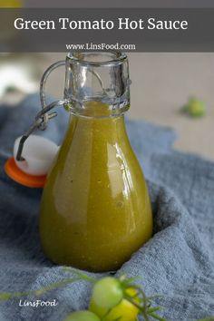 green tomato hot sauce in a glass bottle