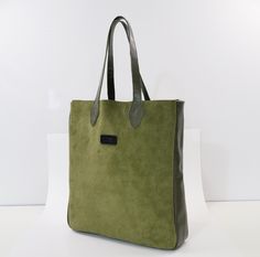 "OZEN custom made 2 tone moss green and olive leather tote bag.  ( Custom colors available upon request ) Measurements : 15\" tall 13.5\" wide 3.5\" depth 9\" handle length (securely sits over shoulder) Made from high quality cowhide leathers and solid brass hardware. Every Ozen product is designed & handcrafted in Los Angeles CA by Aykut Ozen. Note : Hat shown in the last photo is for reference only. This sale is for the bag only." Green Suede Shoulder Bag For Everyday Use, Green Suede Bags For Everyday Use, Green Suede, Brass Hardware, Moss Green, Leather Tote Bag, Cowhide Leather, Leather Tote, Custom Made