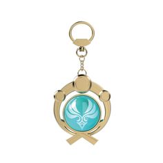 a keychain with an emblem on the front and back of it, in gold