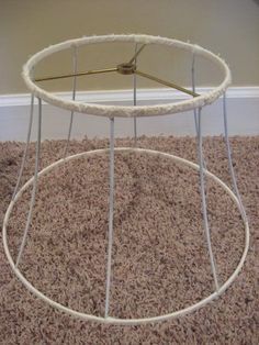 a white table sitting on top of a carpet covered floor