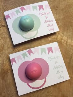 two greeting cards with a pink and blue ball